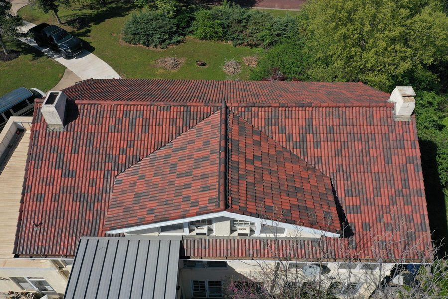Aerial drone view of a finished concrete tile roof on an Oklahoma home