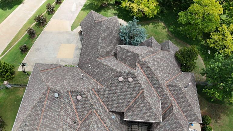 Complex multi-gable shingle roof in Oklahoma City