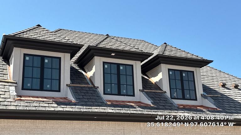 Three dormers with copper trim accents in Oklahoma City
